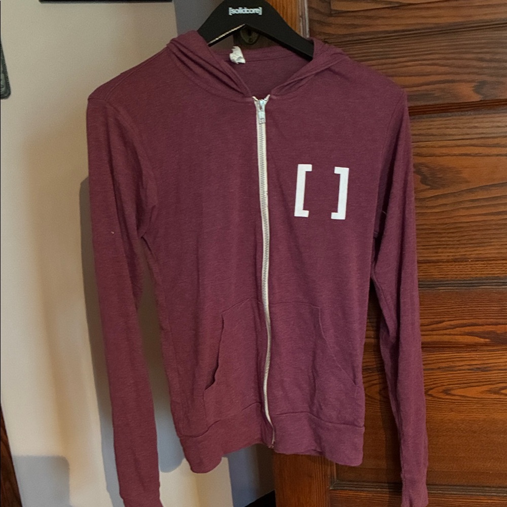 Bella Canvas Burgundy Zip-Up Hoodie with White Bracket Graphic